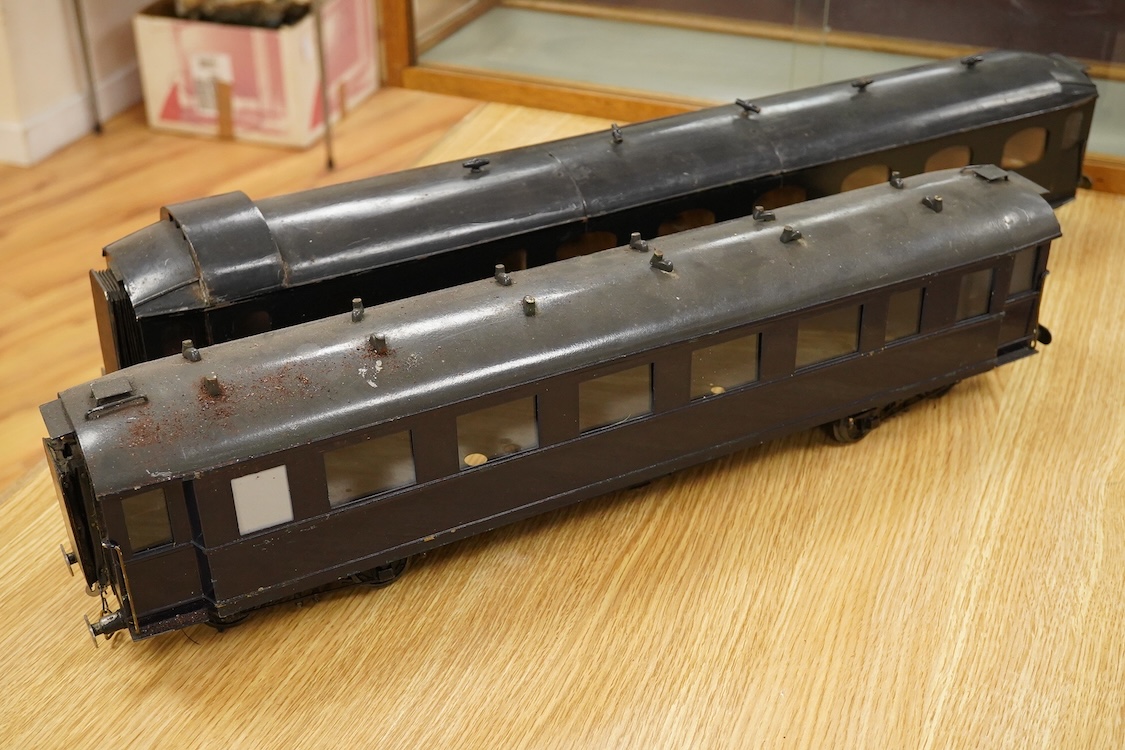 Four Gauge One Continental bogie coaches; two in very dark Green livery, and two ‘Trains Rapides Nord’ in dark green, including some scratch building and possible adaptation from kits